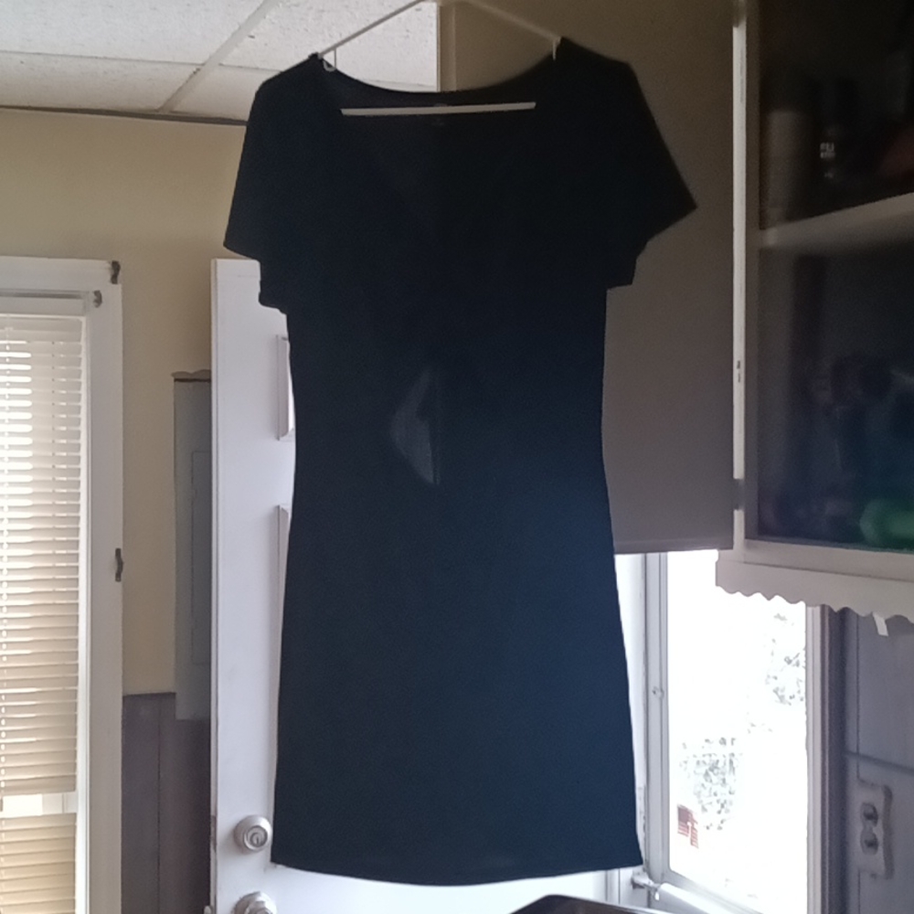 Black dress. Casual from shine curve.
